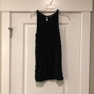 Black twist tie front shirt.